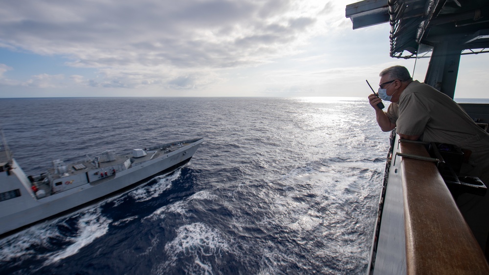 USNS Pecos practices refueling with partnering nations