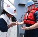 Hospital Corpsman Assigned to USS Truxtun (DDG 103) Renders Aid