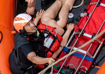 USS Frank Cable Conducts Man Overboard Drill