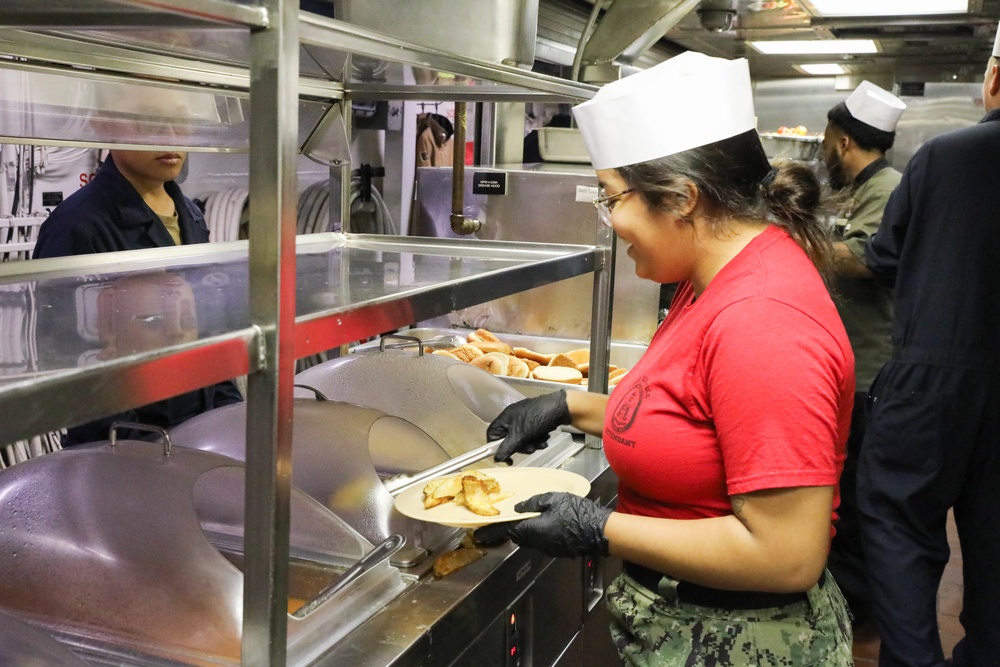 Culinary Specialist Prepares Food Aboard the USS Truxtun (DDG 103)