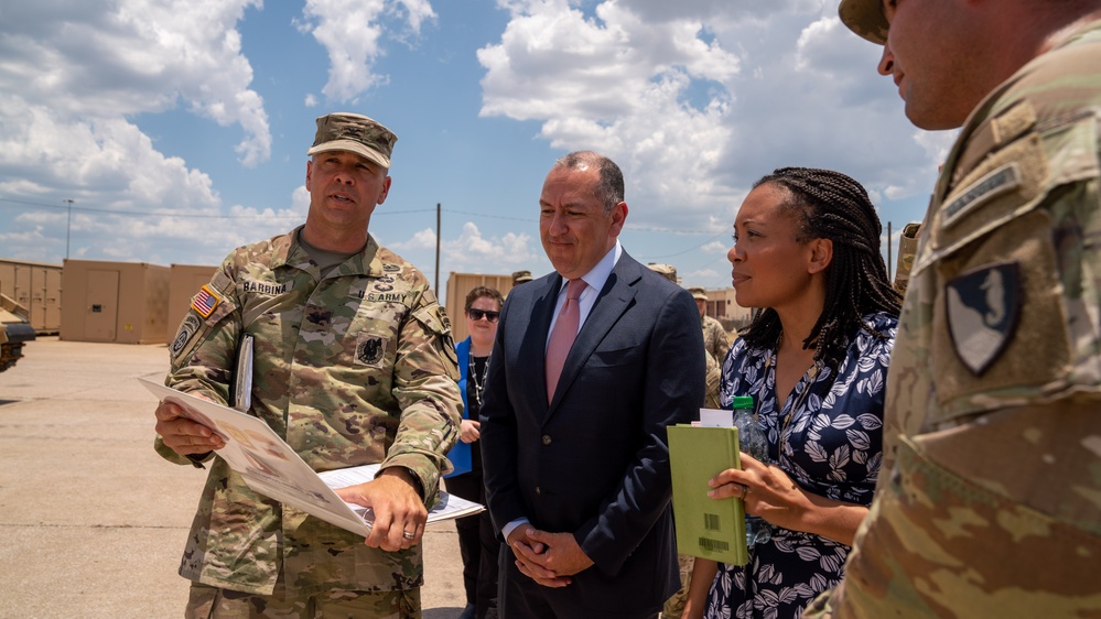 Commander of the 36th Engineer Brigade briefs the Under Secretary of the Army