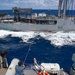 HMCS Vancouver conducts a RAS with HMNZS Aotearoa during RIMPAC 2022