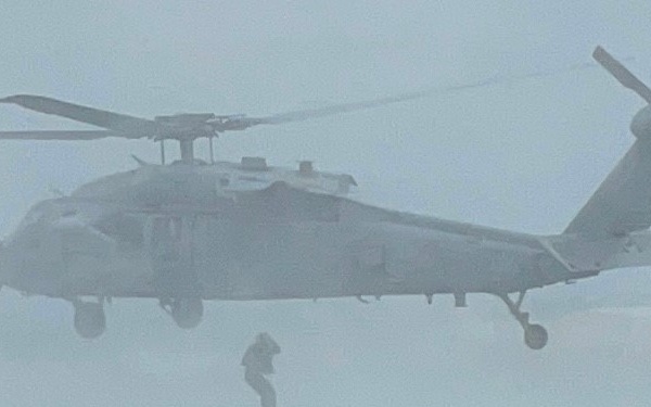 Royal Australian Navy Divers Cast and Recover with HSC 21