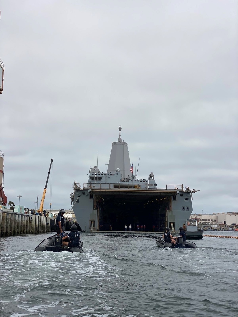 Royal New Zealand Navy Sailors Onload Small Boats to USS Portland