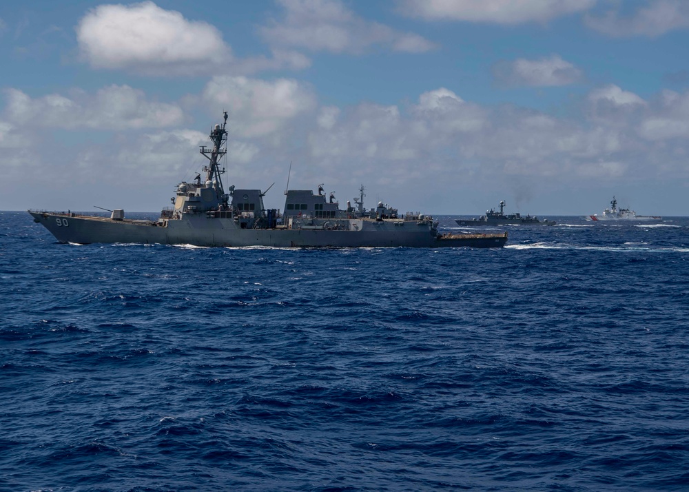 USS Gridley transits in formation with allied partners