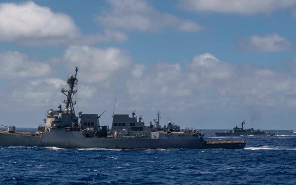 USS Gridley transits in formation with allied partners