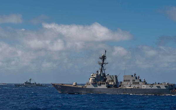 USS Gridley transits in formation with allied partners
