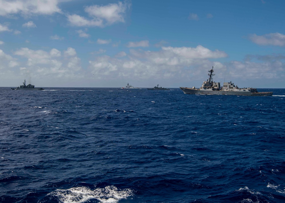 USS Gridley transits in formation with allied partners