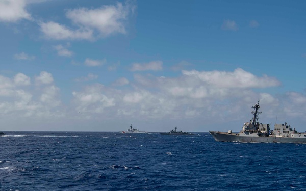USS Gridley transits in formation with allied partners