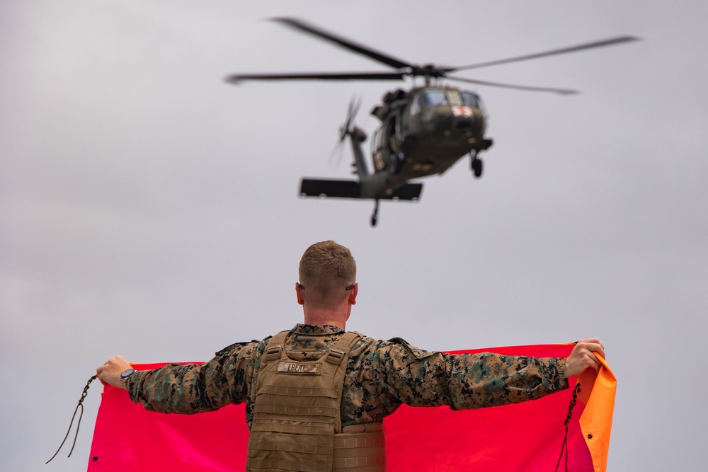 HADR participants arrive at Ford Island HLZ during RIMPAC 2022