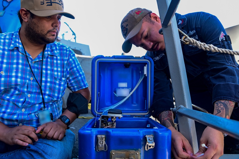 NSWC Corona Technicians install ITU BLOS tracker systems for RIMPAC 2022