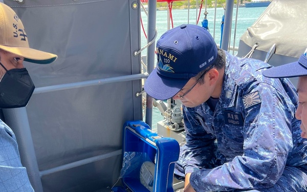 NSWC Corona Technicians install ITU BLOS tracker systems for RIMPAC 2022