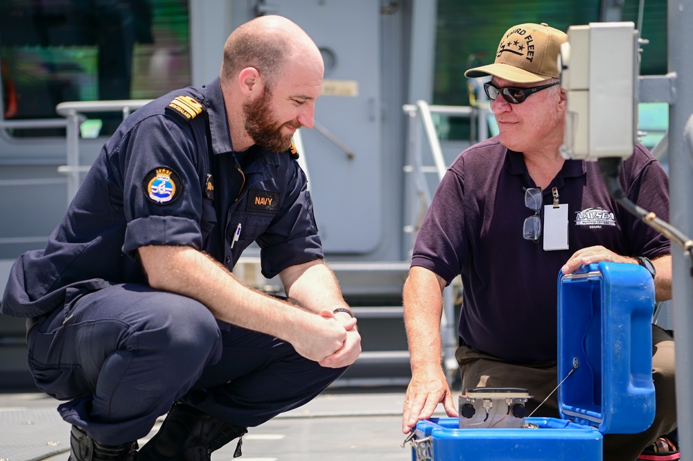 NSWC Corona Technicians install ITU BLOS tracker systems for RIMPAC 2022