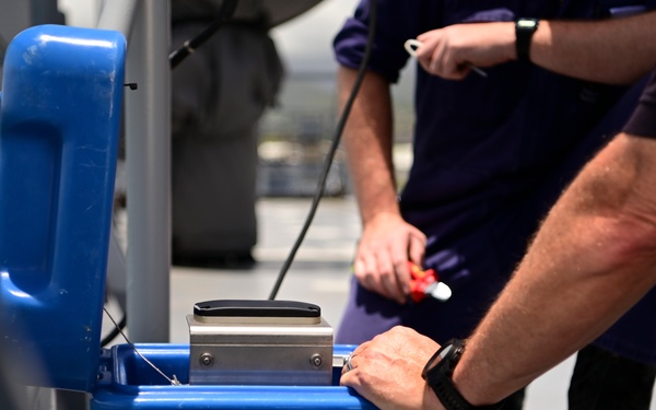 NSWC Corona Technicians install ITU BLOS tracker systems for RIMPAC 2022
