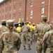 Warrant Officer Candidate School holds sign, song and hat ceremony