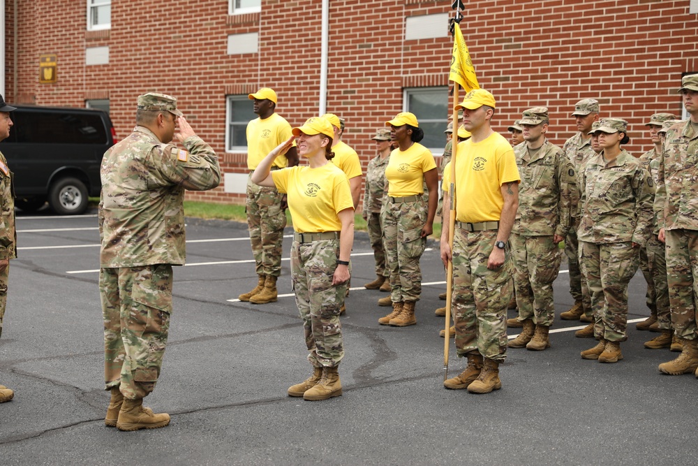 Warrant Officer Candidate School holds sign, song, and hat ceremony
