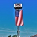 Firefighters and the American flag for Fort McCoy Garrison Change of Command ceremony