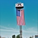 Firefighters and the American flag for Fort McCoy Garrison Change of Command ceremony