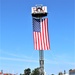Firefighters and the American flag for Fort McCoy Garrison Change of Command ceremony