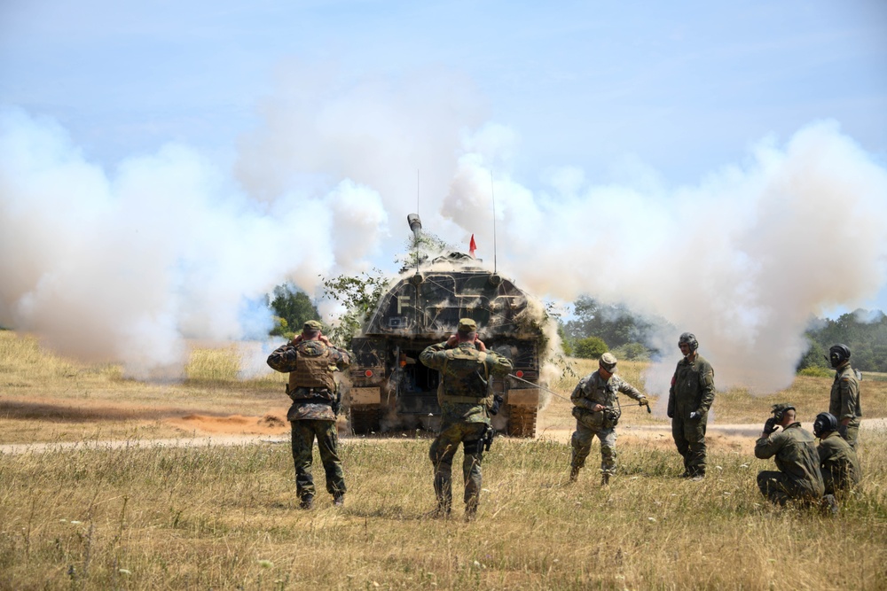 U.S. Soldier fires German Artillery during exercise Dynamic Front 22