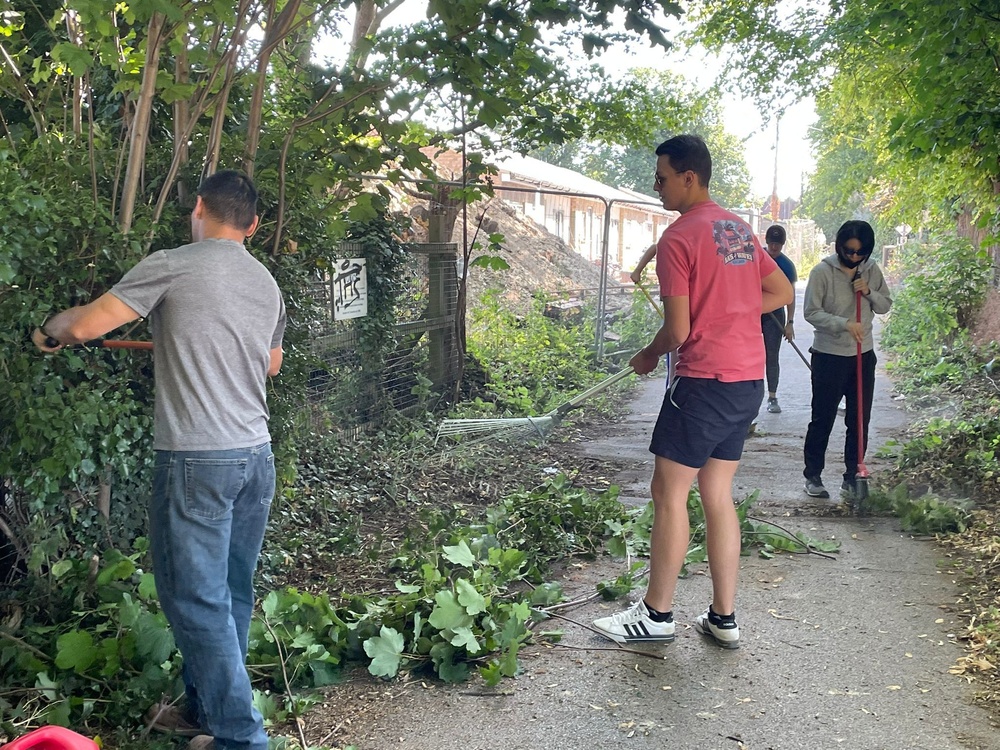 Team Mildenhall members clean path