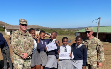 New York Army National Guard Soldiers recognize South Africa's  Nelson Mandela Day alongside  South Africa students