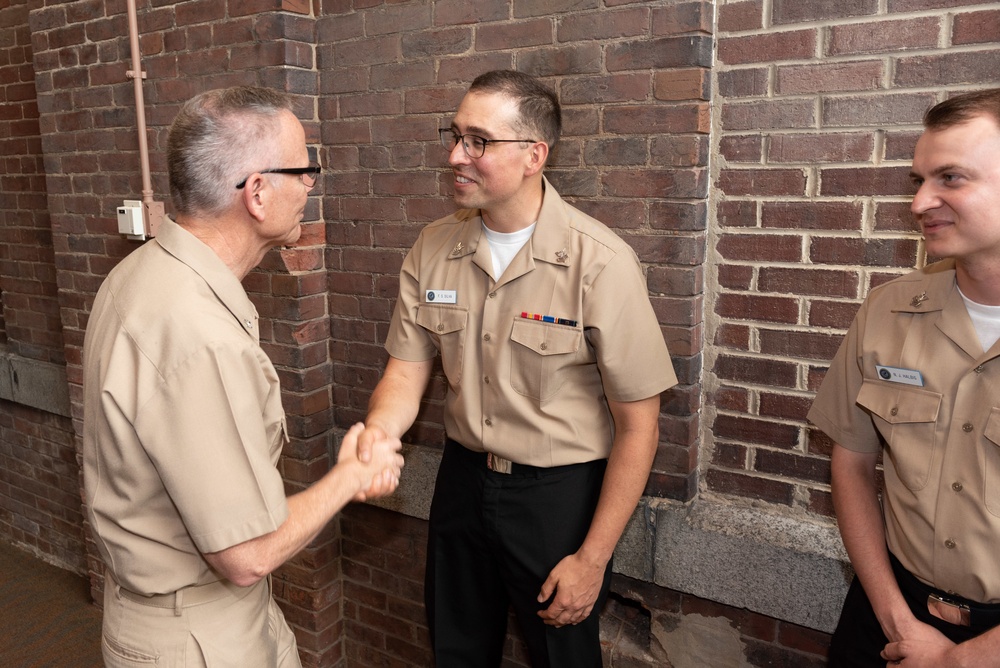 Musician 1st Class Franklin Silva and Musician 1st Class Nicholas Halbig are pinned upon arrival at U.S. Navy Band