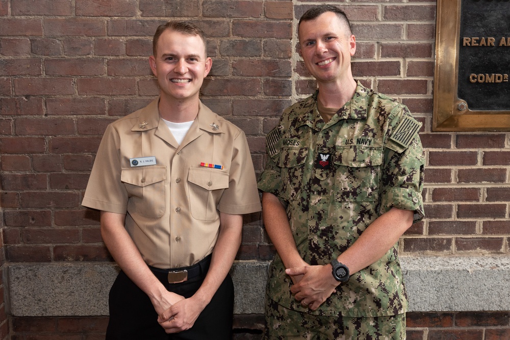 Musician 1st Class Franklin Silva and Musician 1st Class Nicholas Halbig are pinned upon arrival at U.S. Navy Band