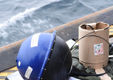 USCGC Oak (WLB 211) crew drops International Ice Patrol buoy near Greenland