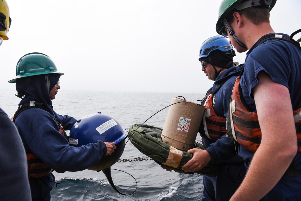 USCGC Oak (WLB 211) crew drops International Ice Patrol buoy near Greenland