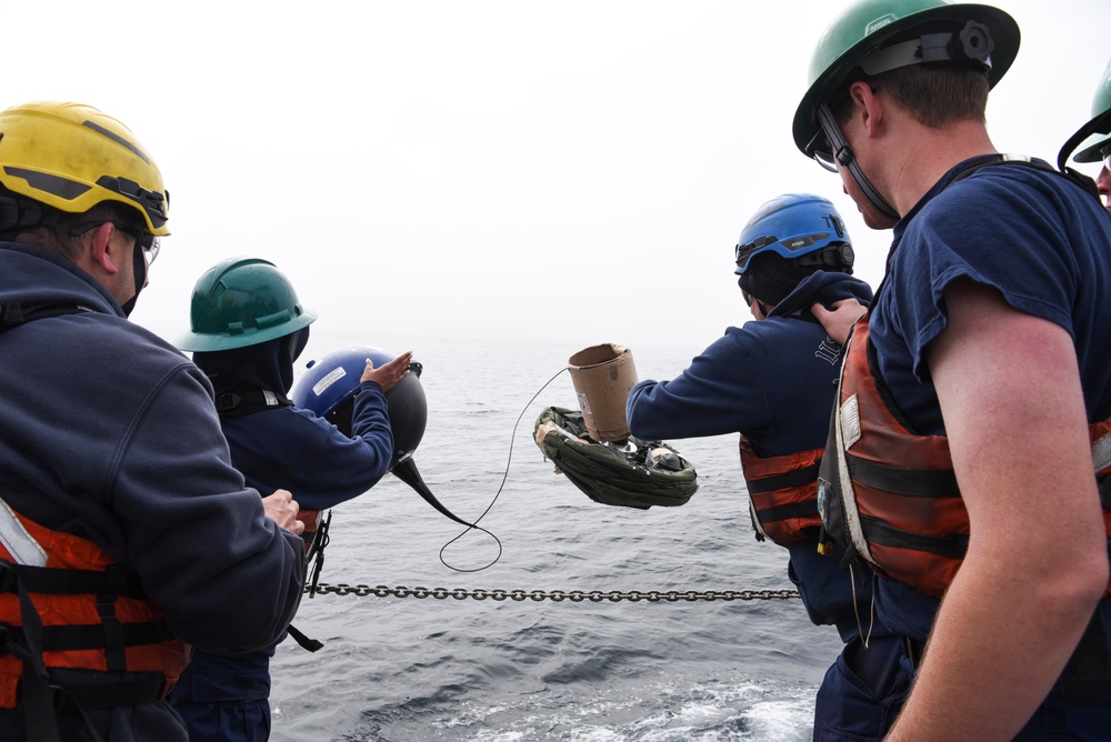 USCGC Oak (WLB 211) crew drops International Ice Patrol buoy near Greenland