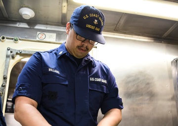 USCGC Oak (WLB 211) culinary specialist prepares lunch