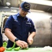 USCGC Oak (WLB 211) culinary specialist prepares lunch