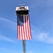 Firefighters and the American flag for Fort McCoy Garrison Change of Command ceremony