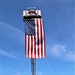Firefighters and the American flag for Fort McCoy Garrison Change of Command ceremony
