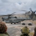 Two CH-53E Super Stallions take off