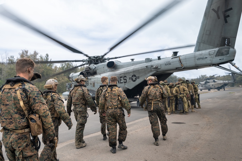 U.S. Marines board a CH-53E Super Stallion