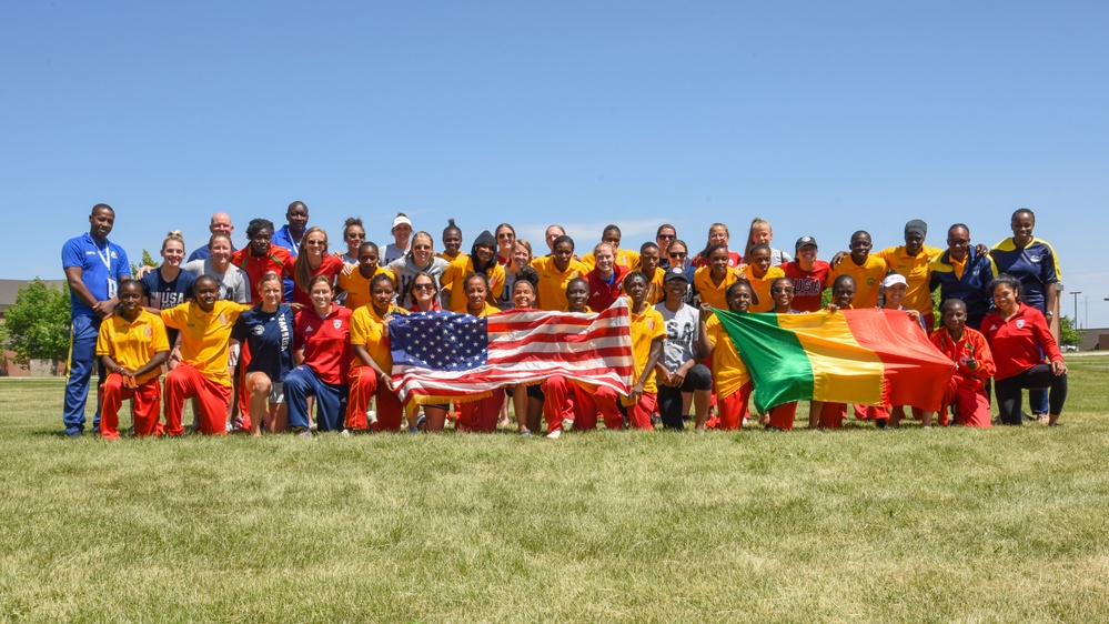 United States Military Women's Soccer Team; Mali Military Women's Soccer Team pose for a photo