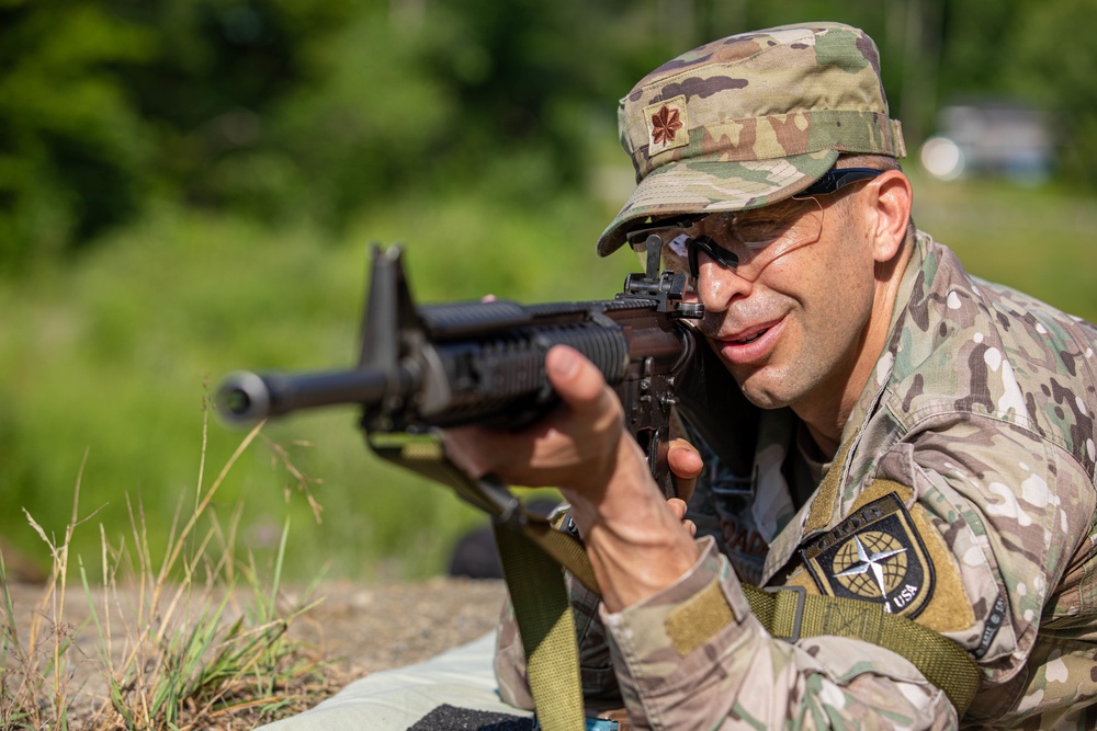 Maj. Sterling Broadhead checks his sight picture