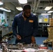 Abraham Lincoln Sailors conduct aircraft maintenance