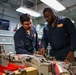 Abraham Lincoln Sailors conduct aircraft maintenance