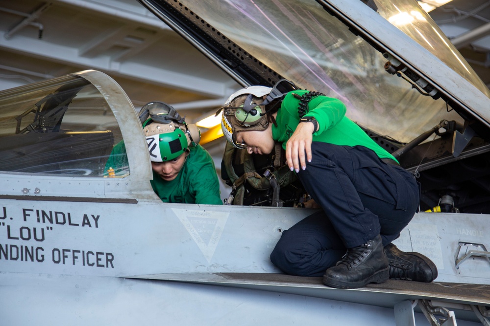 Abraham Lincoln Sailors conduct aircraft maintenance