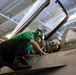 Abraham Lincoln Sailors conduct aircraft maintenance