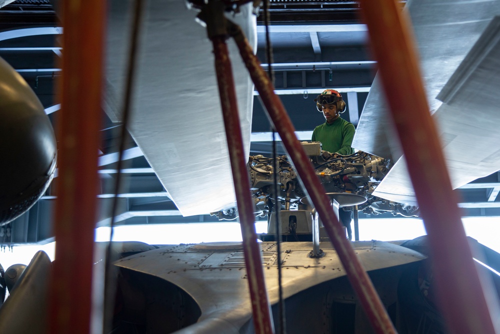 Abraham Lincoln Sailors conduct aircraft maintenance