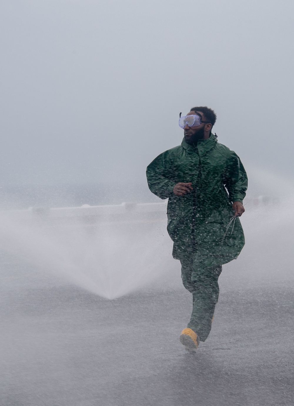 USS America (LHA 6) Sailors Conduct Counter Measure Wash Down