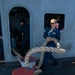 Sailor Removes Line From Bollard