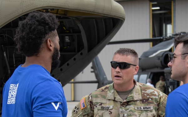 UM football team visits Grand Valley Armory
