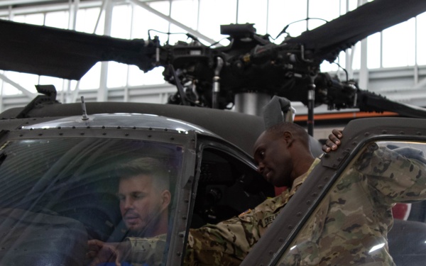 UM football team visits Grand Valley Armory