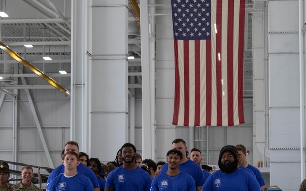UM football team visits Grand Valley Armory