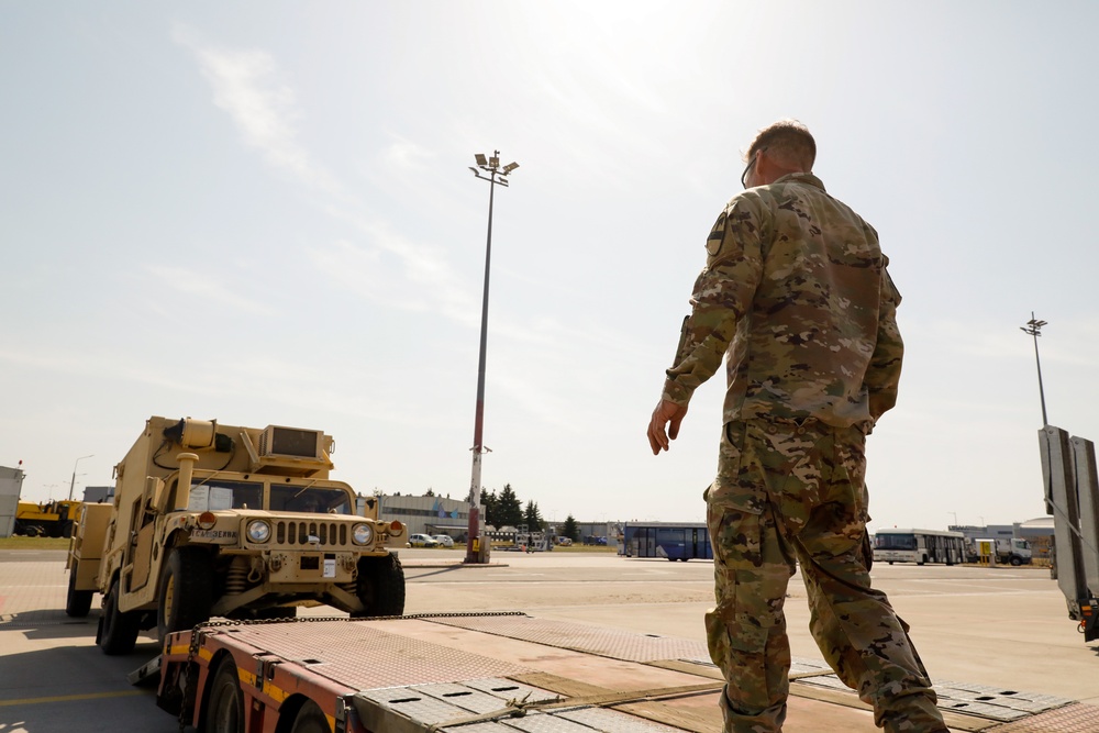 Grey Wolf Brigade moves equipment in Poland